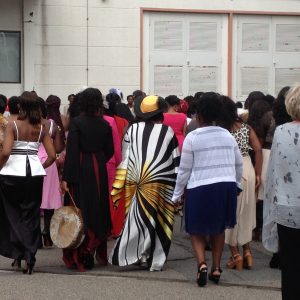 African women going to a worship