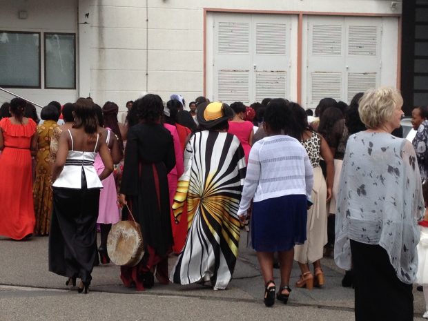 African women going to a worship