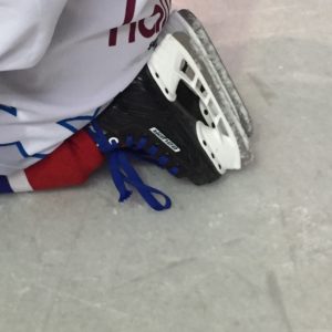Ice Skating: Hockey shoes in the ice rink.